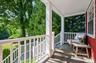 Covered front porch, great for overseeing the action in the neighborhood
