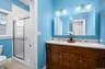 Hall bath with separate toilet/shower area perfect for privacy