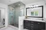 Spa-like primary bath with steam shower