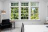 Expansive primary windows with morning light