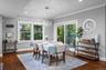Separate dining with direct access to the deck and backyard.