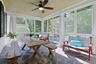 Enclosed porch with ceiling fan