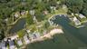Aerial view of the waterfront property, boat slip, private beach, marina