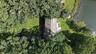 Aerial view of the home and waterfront property