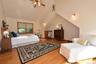 Primary Bedroom with vaulted ceiling, waterviews and 3 closets