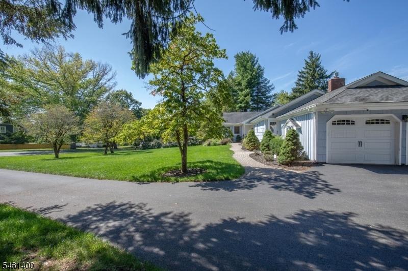 Paved driveway to 2 car garage