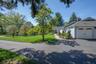 Paved driveway to 2 car garage