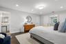Primary Bedroom w/ En-Suite Bathroom
