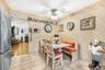 Kitchen featuring light-toned cabinetry, tile flooring, and stainless steel appliances