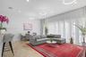 Bright open living area/w 11-ft ceilings & floor-to-ceiling windows & entrance to Private Back Yard.