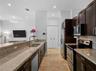 Gourmet kitchen with granite countertops and breakfast bar