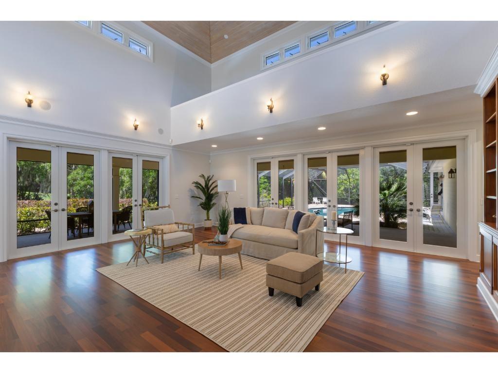 The inviting great room offers beautifully finished real wood flooring