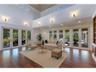 The inviting great room offers beautifully finished real wood flooring