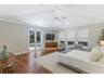 The primary suite also offers access to the lanai area