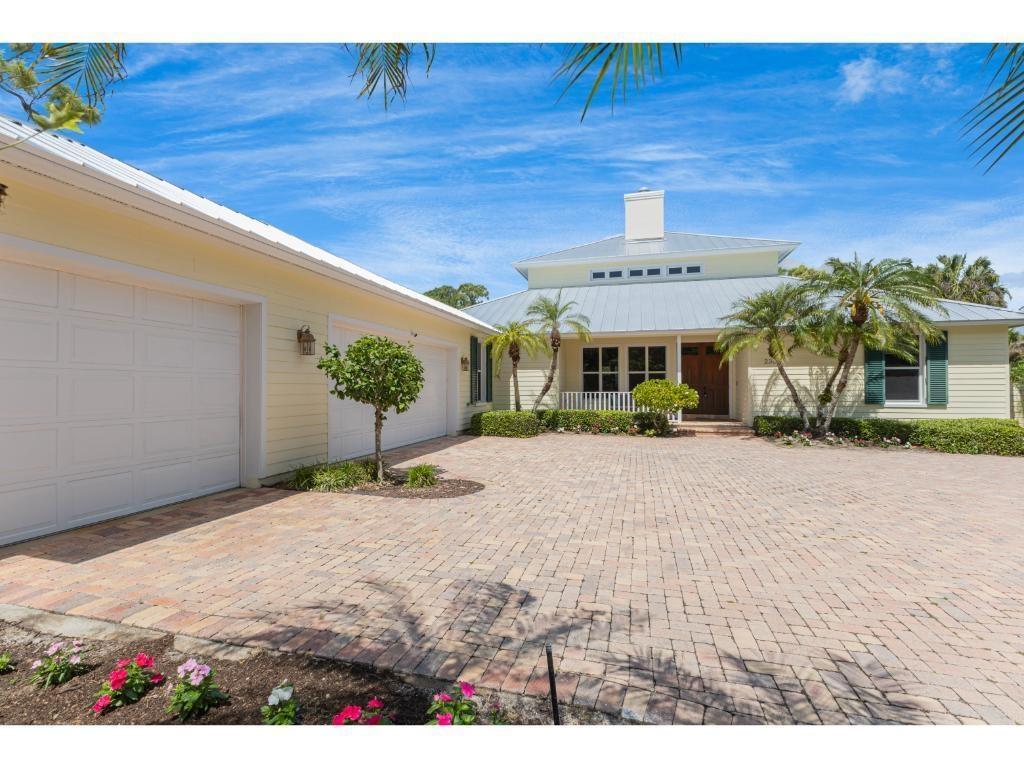 The oversized 3 car garage offers plenty of storage and room to park a golf cart