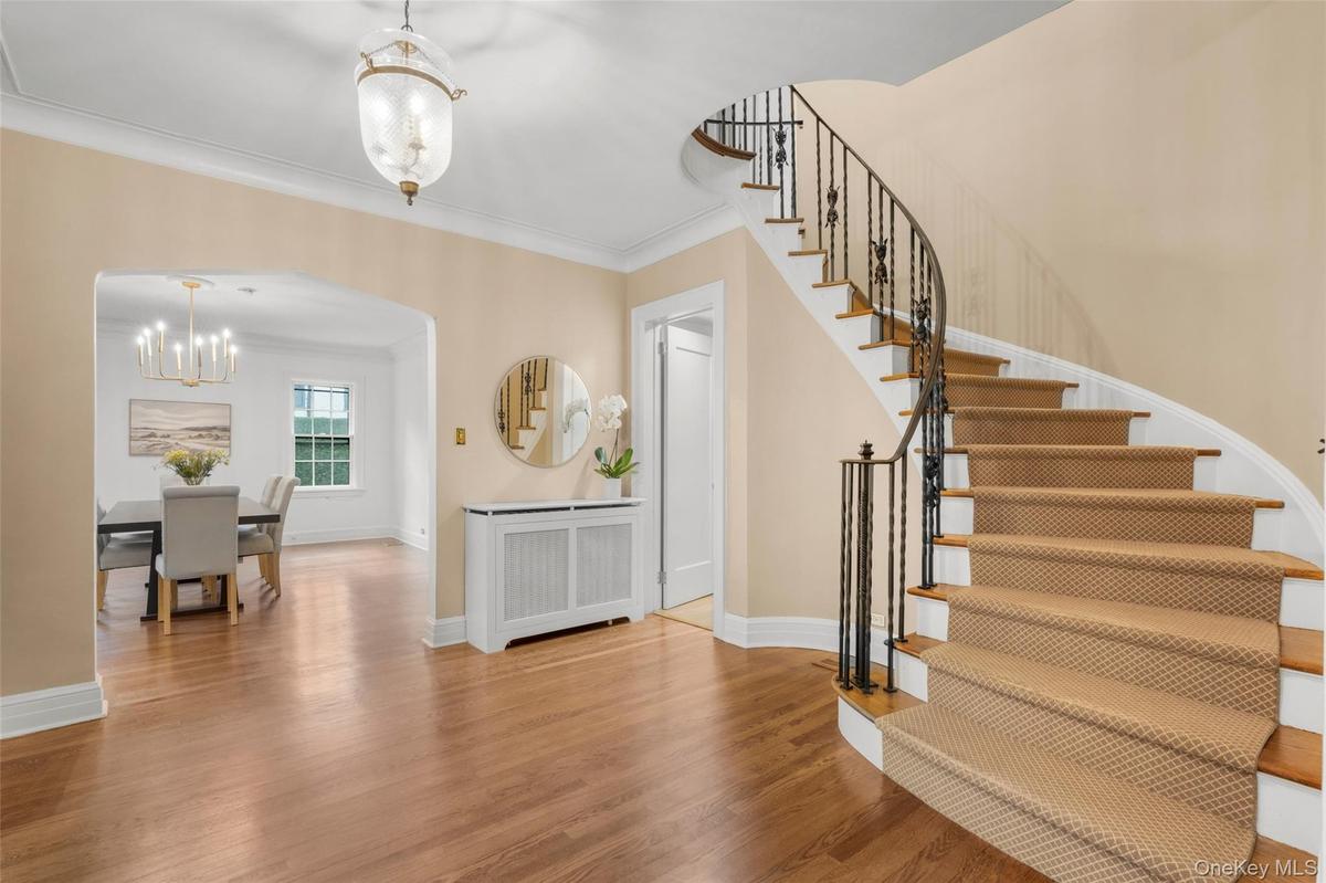 Foyer with view into spacious dining room