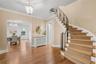 Foyer with view into spacious dining room