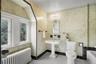 Primary bathroom with tub and shower