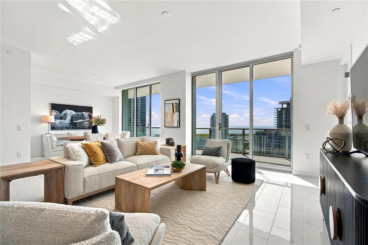 Professionally staged 28-foot great room showcases the exceptional scale and versatility of Residence 2505