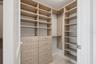 Dual Primary Closets with California Closets systems
