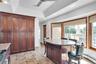 Wall of pantry cabinets.