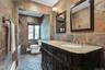Beautifully updated bathroom with double sinks.
