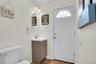 Half bath with outside entrance from the yard.
