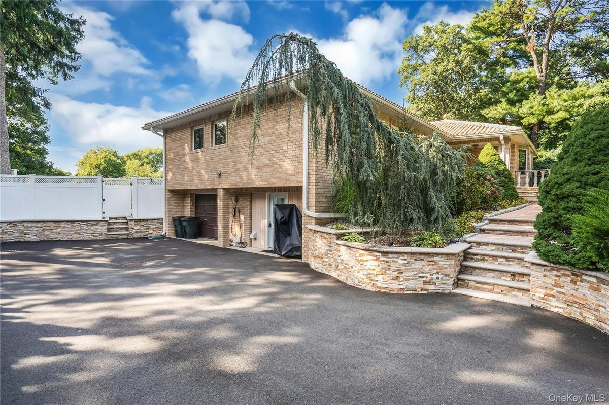 2 Car Garage with ample driveway parking.