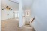 Foyer and stairs up to living room