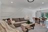 Open-concept living space seamlessly flowing into the dining area