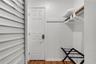 Custom-built walk-in closet with ample shelving and organization