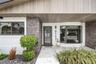 Stone work/ treated wood panels/ bay window