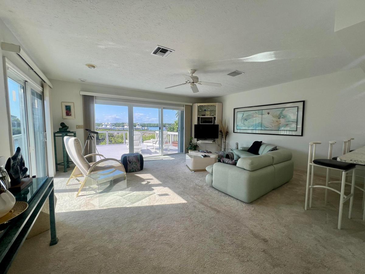 Wall-to-wall carpeting and neutral wall tones