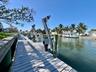Wood dock with boat lifts