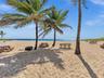 There are 3 charcoal grills at the private beach, with multiple picnic tables and showers.