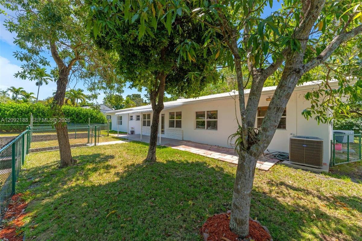 Upper tier - Mature fruit trees + covered porch