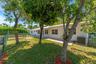 Upper tier - Mature fruit trees + covered porch