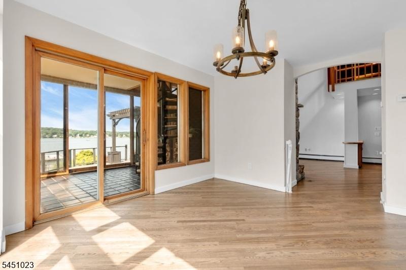 Dining open to sun room