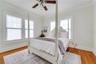 Bedroom 2, full of light, situated off the kitchen in the rear of the home.