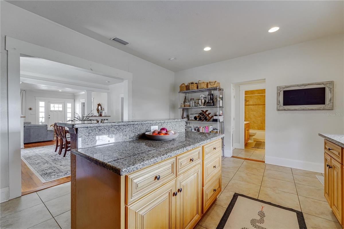 From the kitchen, looking back toward the front door.