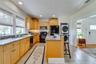 The kitchen was renovated in 2013, along with both bathrooms, and updated plumbing & electrical throughout. The kitchen overlooks the backyard & is sp