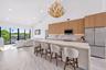 Living room adjacent to kitchen overlooking intracoastal
