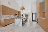 kitchen facing ocean and family room
