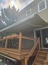 Deck with retractable awning