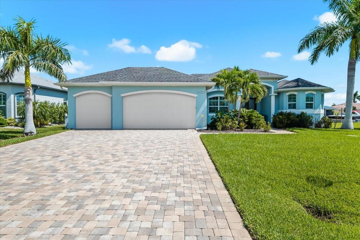 Impressive THREE-Car Garage!
