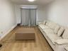 Recessed lighting, wood-finish flooring, and white painted walls