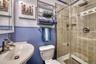 Full bathroom with tile shower
