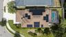 Aerial view - all solar panels are owned. Open space to the side of the house - so only one neighbor.