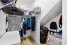 Primary suite walk in closet. Plenty of storage space.