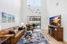 Great room with soaring ceilings, and lots of natural light.